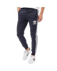 adidas Originals Katoen California Trainingsbroek Marineblauw in ... adidas Originals Katoen California Trainingsbroek Marineblauw in ...