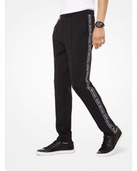 Pantaloni da tuta in tessuto scuba con fettuccia con logoMichael Kors in  Materiale sintetico da Uomo colore Nero | Lyst
