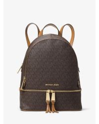 michael michael kors metallic signature rhea zip backpack