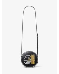 Borsa A Tracolla Rotonda Studio 54 In Pelle Di Vitello Con Intarsi In  Pitone di Michael Kors in Nero | Lyst