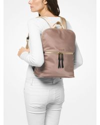 mk polly slim backpack