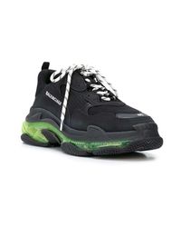 Triple s clara suela amarilla gripe Negro Balenciaga de hombre de color  Negro | Lyst