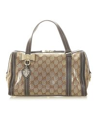Bauletto in duchessa con cristalli gg di Gucci in Marrone | Lyst