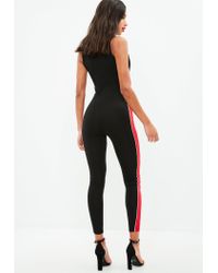 red and black striped jumpsuit