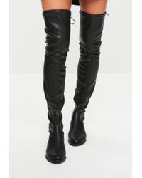 black leather over the knee flat boots
