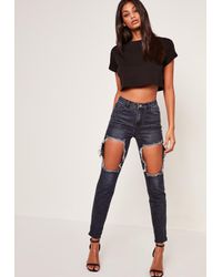 open thigh ripped jeans