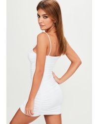 white slinky ruched dress