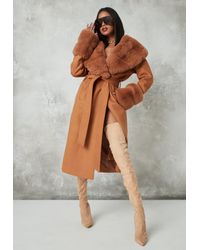 tan coat with fur collar