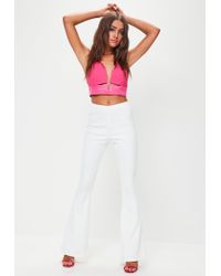 white bandage flared trousers