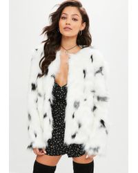 white snow leopard faux fur coat