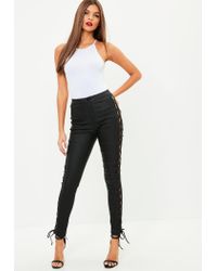 black jeans with lace up sides