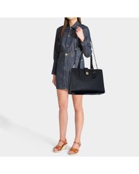 coach turnlock charlie carryall