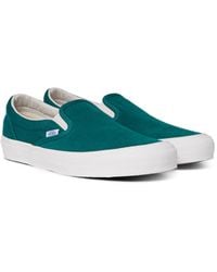 emerald green slip on vans