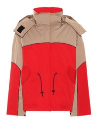 Veste matelassée à capuche KENZO en coloris Red