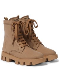 prezzo stivali prada