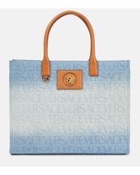 Versace Large All-over Logo Tote Bag in Brown | Lyst Versace Large All-over Logo Tote Bag in Brown | Lyst