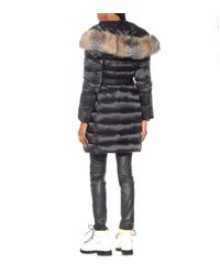 Veste doudoune Tinuv à fourrure Moncler en coloris Black