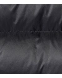 Veste doudoune Tinuv à fourrure Moncler en coloris Black