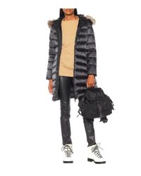 Veste doudoune Tinuv à fourrure Moncler en coloris Black