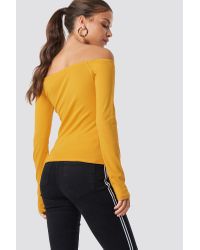 yellow off the shoulder long sleeve top