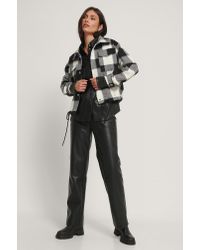 black checkered windbreaker