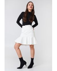 denim skirt with frill at bottom