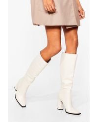 white boots flat heel