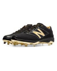 gold and black new balance cleats