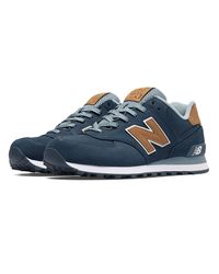 new balance 574 navy tan