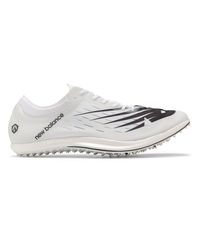 white new balance track spikes