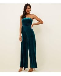 new look green velvet jumpsuit