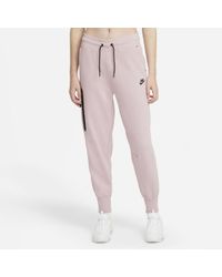 pink nike tech pants