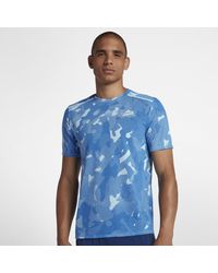 nike tailwind running top