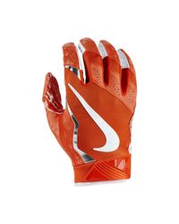 white and orange football gloves