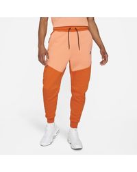 Pantaloni jogger Sportswear Tech Fleece da Uomo di Nike in Arancione | Lyst