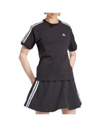 Adidas originals adicolor three stripe stirrup jumpsuit in black best sale