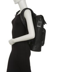 tumi cypress roll top