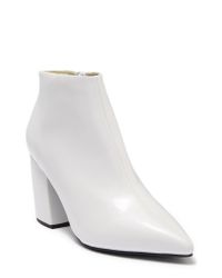 white high heeled booties