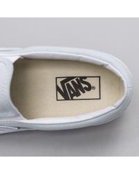 light blue slip on vans