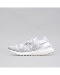 ultra boost uncaged white reflective