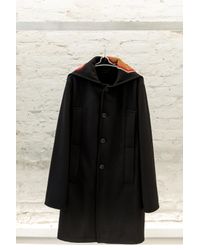 Raf Simons Black Coat With Destroyed Graphic for men
