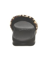 nike leopard sliders