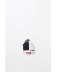 vans mega checker slip on