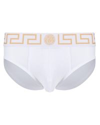 Versace Swim trunks for Men - Up to 70% off at Lyst.com