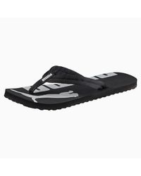 puma flip flops black and white