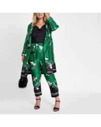 River Island Green Plus Floral Tapered Trousers