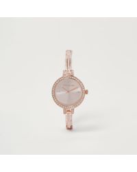 delicate gold watch