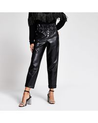 leather peg leg trousers