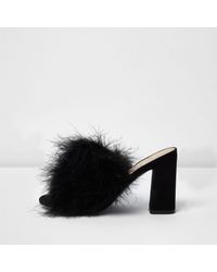 fluffy black block heels