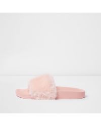light pink fluffy slides